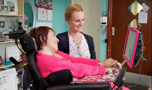 Two people smiling